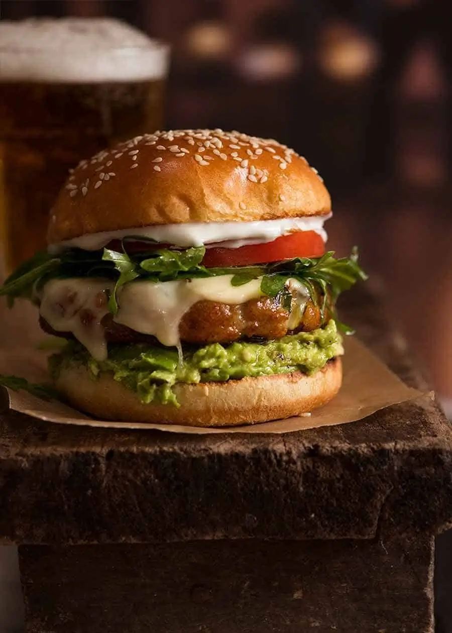 Chicken burger with lettuce, tomato and sauce